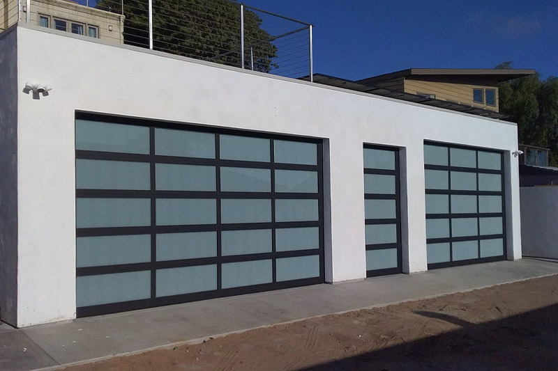 Installation by Garage Door Medics – Black Anodized with White Laminate Installation by Garage Door Medics - Black Anodized with White Laminate